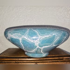 Vintage pottery blue glazed curved lip vase